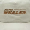 Image of a tan cap with a darker tan Boston Whaler logo embroidered on front