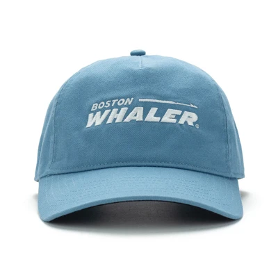 Image of a blue cap with white Boston Whaler logo on front