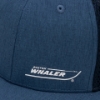 Image of the white Boston Whaler logo on the left front of the Navy Boston Whaler Mesh Trucker