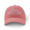 Coral washed baseball cap with a curved bill and white embroidered “Boston Whaler Since 1958” logo on the front.