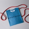 Boston Whaler Performance Shirt folded on dockline