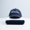 Whaler Cap sitting atop a folded sweatshirt