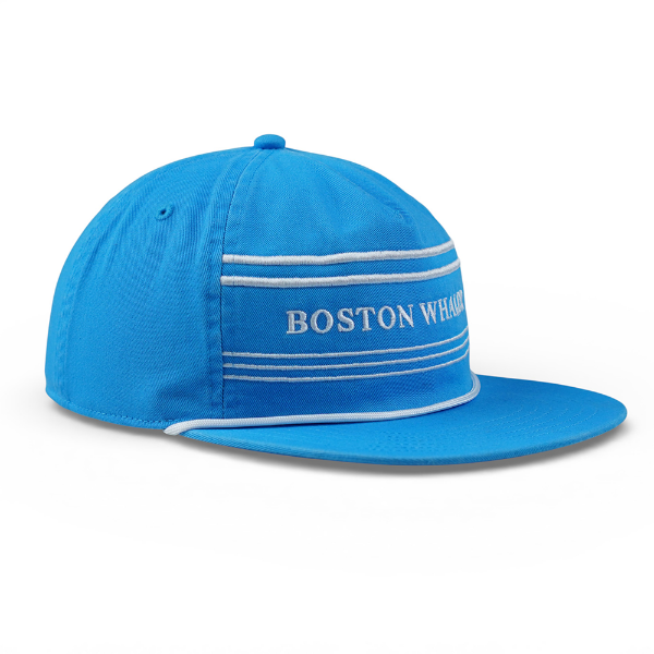 Boston Whaler Cruiser hat in blue with white striped Boston Whaler text logo, side view.