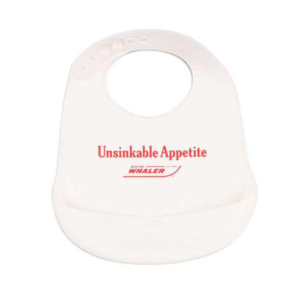 White silicone bib with "Unsinkable Appetite" text above the Boston Whaler logo